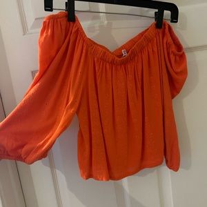 Orange off shoulder shirt